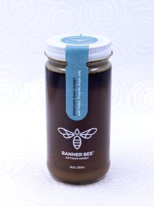 Image of glass jar of raw artisanal honey made by Banner Bee Co.